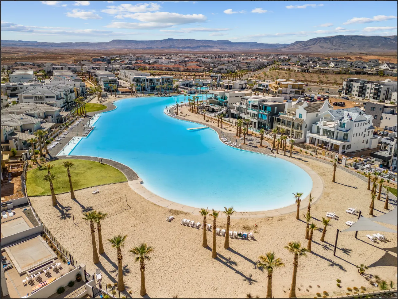 Aerial view of the Desert Color lagoon with sand beaches, palm trees and homes